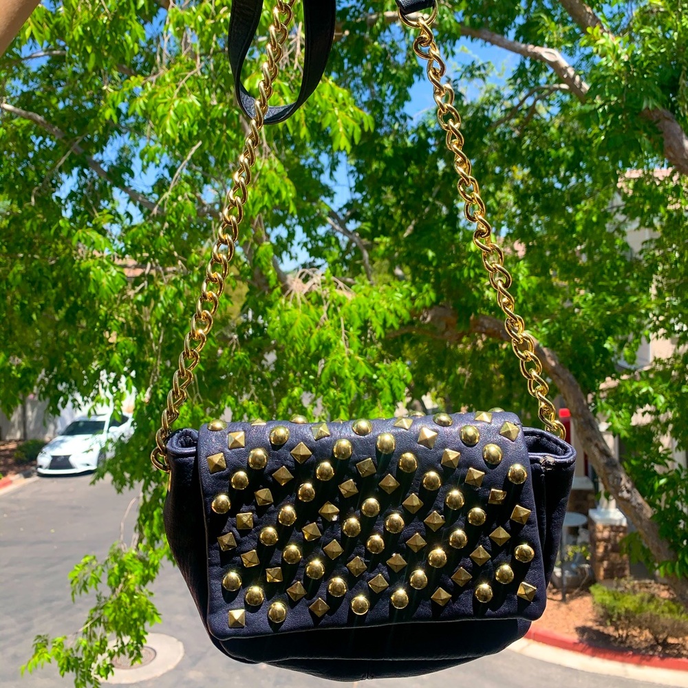 Black and gold studded Steve Madden crossbody bag